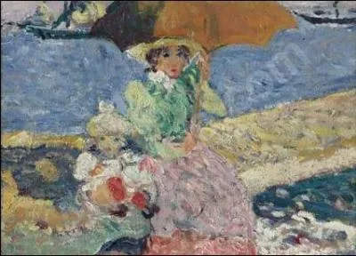 Mre et enfant au bord de la plage.