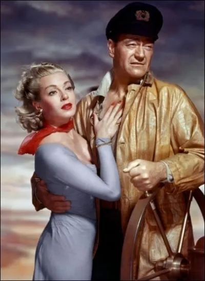 Qui incarne la passagre prise en charge par John Wayne dans  Le Renard des ocans  ?