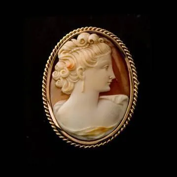 Cette technique de gravure reprsente souvent un profil de dame sur une bague, un pendentif ... . Comment s'appelle-t-il ?