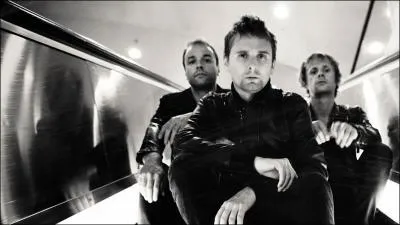 Quel est ce groupe de rock, compos de 3 membres ?