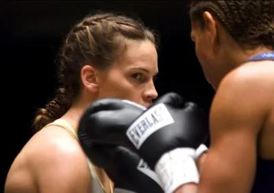  Million Dollar Baby  : sorti en 2004, ce film raconte l'histoire d'une femme qui devient boxeuse, une boxeuse entrane par un personnage jou par le ralisateur de ce film. Qui est-il ?