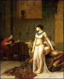 Selon la lgende, dans quoi Cloptre s'est-elle cache pour pntrer dans le palais royal d'Alexandrie afin d'y rencontrer Csar pour la premire fois ?