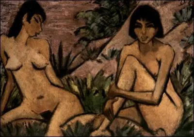 Deux jeunes filles assises dans les dunes.