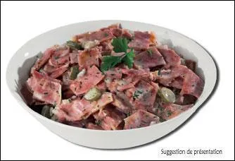 Quel est le nom de cette prparation utilisant la tte du cochon, servie avec une sauce de salade ?