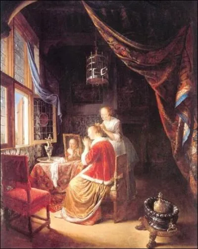 La dame devant sa coiffeuse.