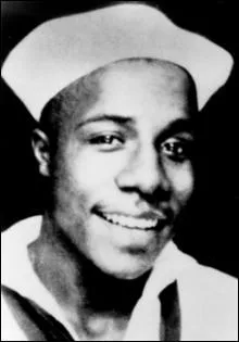 Il a collabor  l'criture de l'autobiographie de Malcom X et est connu aussi pour son roman  Racines , comment s'appelle-t-il ?