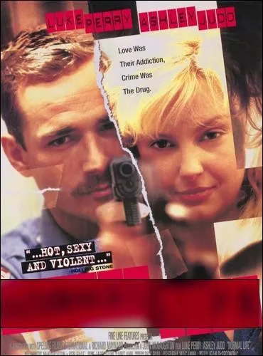 Dans ce film, dont l'affiche est coupe en deux par les bords d'une photo dchire, Ashley Judd est une femme djante qui entraine un gentil flic, amoureux d'elle, sur les voies du banditisme... Il s'agit de :