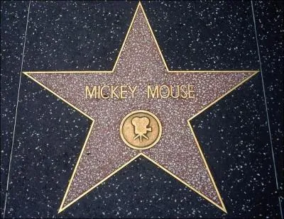 En quelle anne, Mickey devient le premier personnage de dessin anim a obtenir une toile sur le clbre Walk of fame  Hollywood.