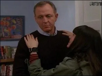 Quel mtier exerait le pre adoptif de Paige ?