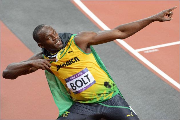Qui détient le record du monde de 100 mètres et 200 mètres en 2013 ?