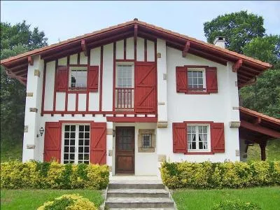 Avec quelle teinte de peinture rouge les Basques peignaient-ils leurs maisons ?