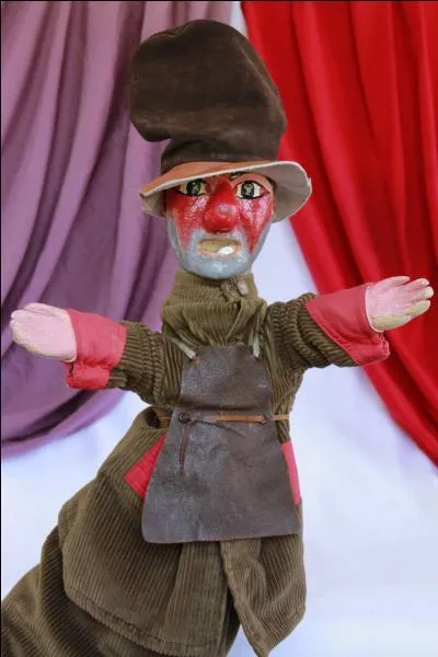 Quel est le mtier de Gnafron, le cousin de Guignol ?