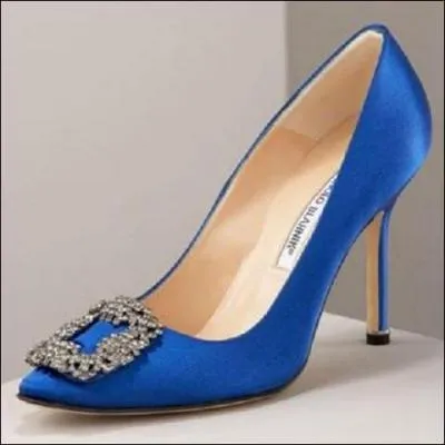 Encore une chaussure de Carrie Bradshaw, qui joue un rle dterminant dans le film tir de la srie (le numro un). Pourquoi ?