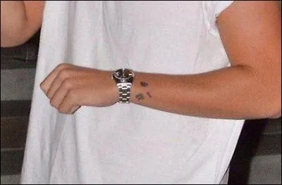 A qui appartient ce tatouage ?