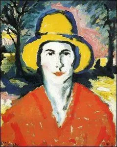 Portrait de femme au chapeau jaune.
