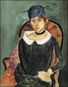 Le chapeau de plume d'autruche.