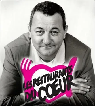 En quelle anne Coluche a-t-il cr   Les Restaurants du coeur   ?