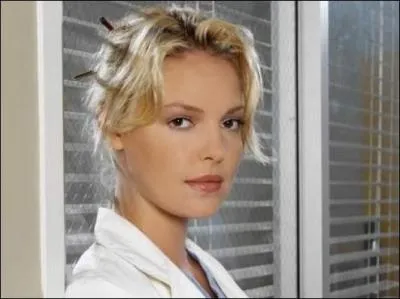 Quel job Izzie avait-elle pour payer ses tudes de mdecine ?