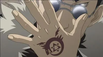 O Greed a-t-il le tatouage de l'Ouroboros ?