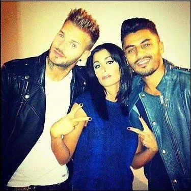 Comment s'appelle son chorgraphe de   A La Poursuite Du Bonheur Tour  ?