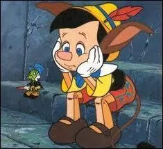 A la fin de l'histoire, en quoi Pinocchio se transforme-t-il ?