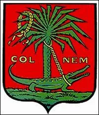 Sur le blason de quelle ville du Languedoc-Roussillon peut-on voir un crocodile attach  un palmier ?