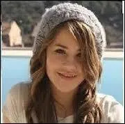 Qui est-ce ? Comment peut-on la dcrire ?