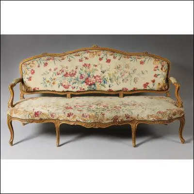Quel est le nom de ce canap Louis XV, dont les accotoirs prsentent des enroulements trs prononcs, mais ne possdant pas de dossier ?