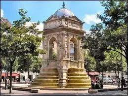 Quels sont les noms et prnoms de ce sculpteur franais, qui a ralis les nymphes de 'La fontaine des Innocents  ?