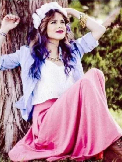 Martina a-t-elle un tatouage ? Si oui, qu'y a-t-il écrit dessus ?