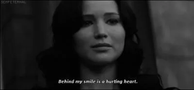 L'aprs-midi des  pains  quand Katniss tait jeune et que Peeta lui a donn les pains, que Katniss faisait-elle ?