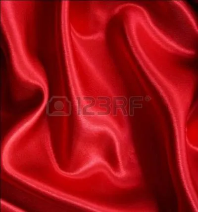 Quel adjectif emploie Marcel Proust pour parler d'un rouge orang dans  le temps retrouv  :  la noblesse de sa pose contrastait avec l'clat merveilleux de sa robe Empire en une soierie ...  