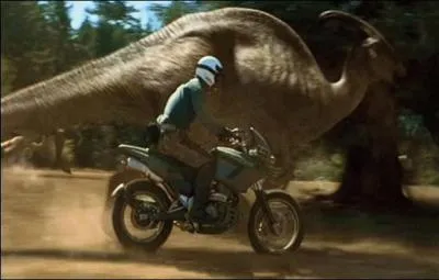 Quel dinosaure est poursuivi par un homme ?