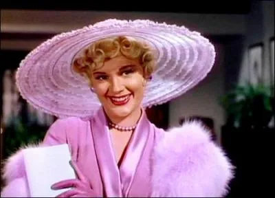 Qu'est-ce que Lina Lamont demande  Mr. Simpson lorsqu'elle apprend que Kathy Selden fait sa voix ?