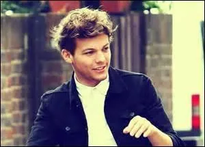 Dans quel groupe Louis tait-il lorsqu'il avait 14 ans ?