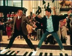 Dans quel film de 1988 Tom Hanks joue-t-il un enfant qui se retrouve dans la peau d'un jeune adulte ?