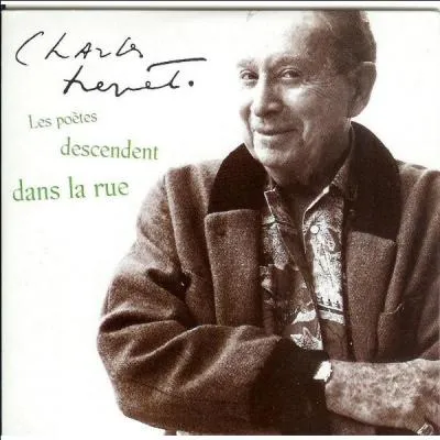 Le chanteur Charles Trenet dite un nouveau disque :  Les potes descendent dans la rue .