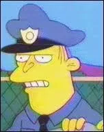 Il est l'un des deux policiers qui aident le chef sur presque toutes les missions. Il n'est pas aussi stupide que le Chef de police. Comment s'appelle-t-il ?