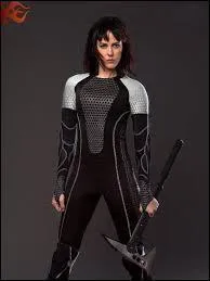 Qui est cette femme du District 7, ayant participé aux Jeux de l'Expiation ?