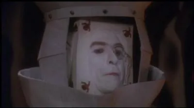 Comment s'appelle ce savant au service d'un mal rongeant Fantasia et ayant invent une machine faisant perdre un souvenir  Bastien chaque fois qu'il utilise l'Auryn pour faire un voeu ?