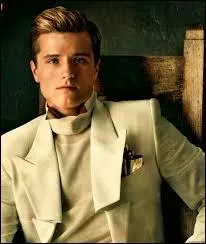 Comment Katniss apprend-elle que Peeta l'aime ?