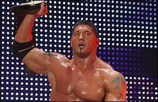 Qui est ce catcheur et champion du monde poids lourd?