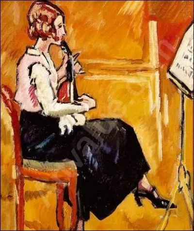 Jeune fille jouant de la guitare.