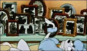 Quel(s) chien(s) peut-on voir parmi les portraits de cette scne d' Olivier et Compagnie  ?