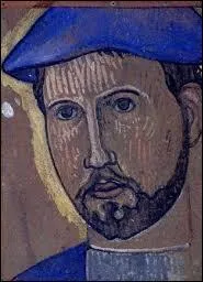 Tte d'un homme dans un bret bleu.