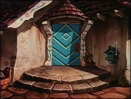 Cette chaumire  la jolie porte dcore et peinte, orne d'une marquise (le petit toit au-dessus de la porte), abrite du joli monde, de qui s'agit-il ?