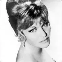 Engourdie sous la neige, elle attend le retour du printemps. Line Renaud y emmnera son chri et ce sera le paradis. Quel est cette chanson ?