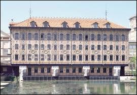 Quel industriel s'est install dans un moulin de Noisiel ( Seine-et-Marne ) en 1825 ?