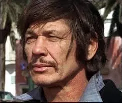 Quelle tait l'ancienne profession exerce par Charles Bronson, profession qu'il a plusieurs fois interprte  l'cran ?