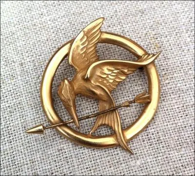 Que représente la broche de Katniss ? (1 réponse)